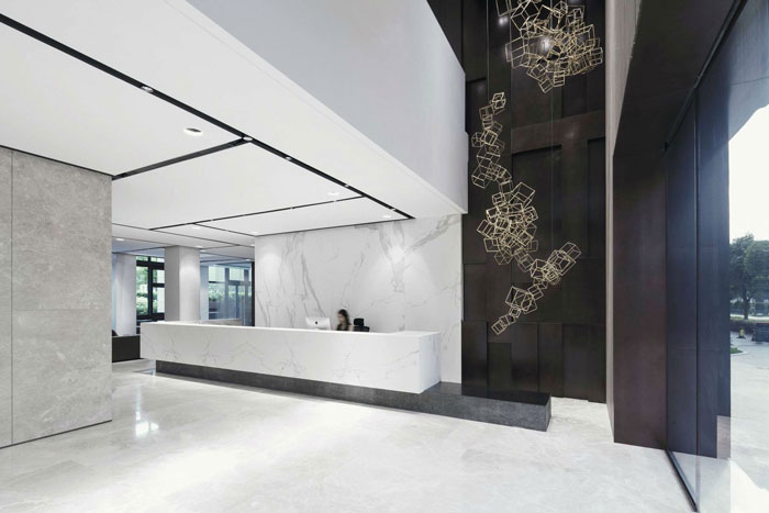 總部大樓辦公室前臺裝修設(shè)計效果圖