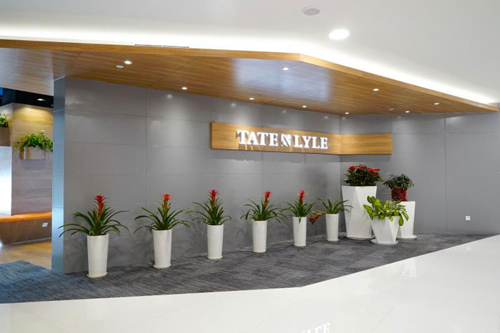 貿(mào)易公司辦公室前臺形象墻裝修設計效果圖